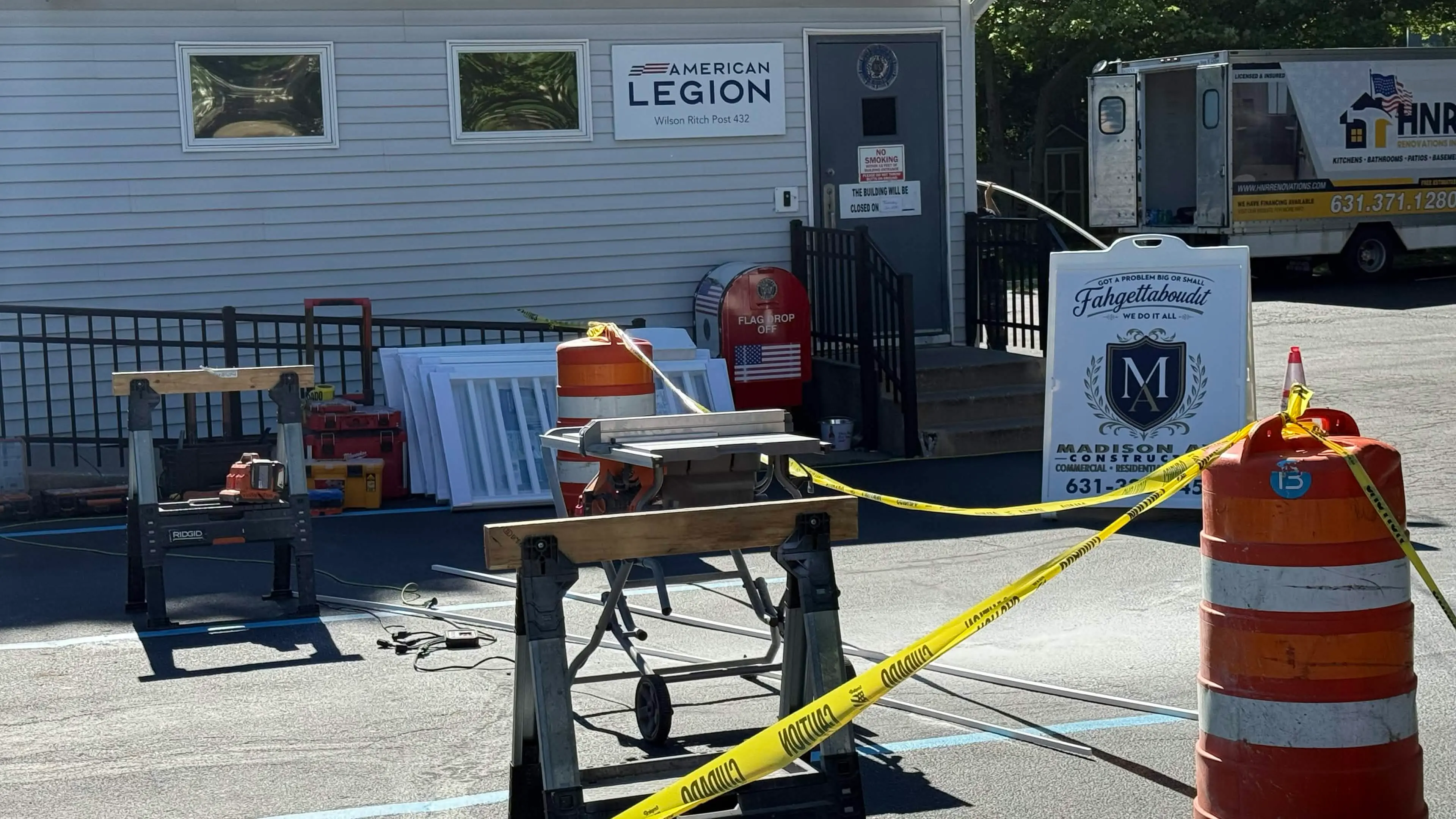 Madison Ave Construction job site set up outside the American Legion post