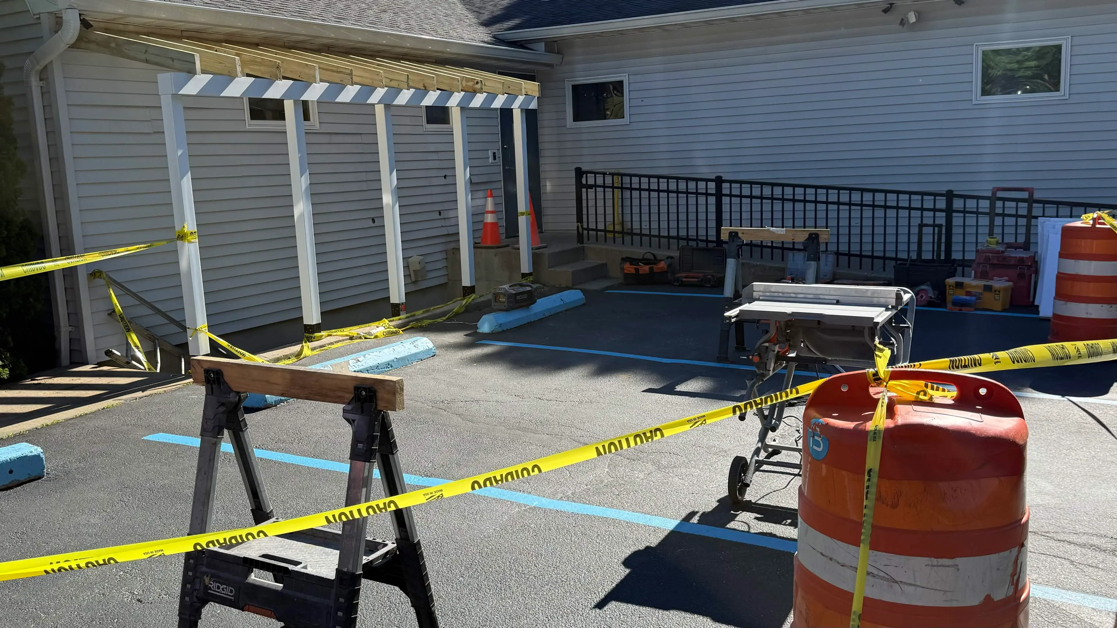 New overhead canopy framed over the side stairwell entrance at American Legion Post 432