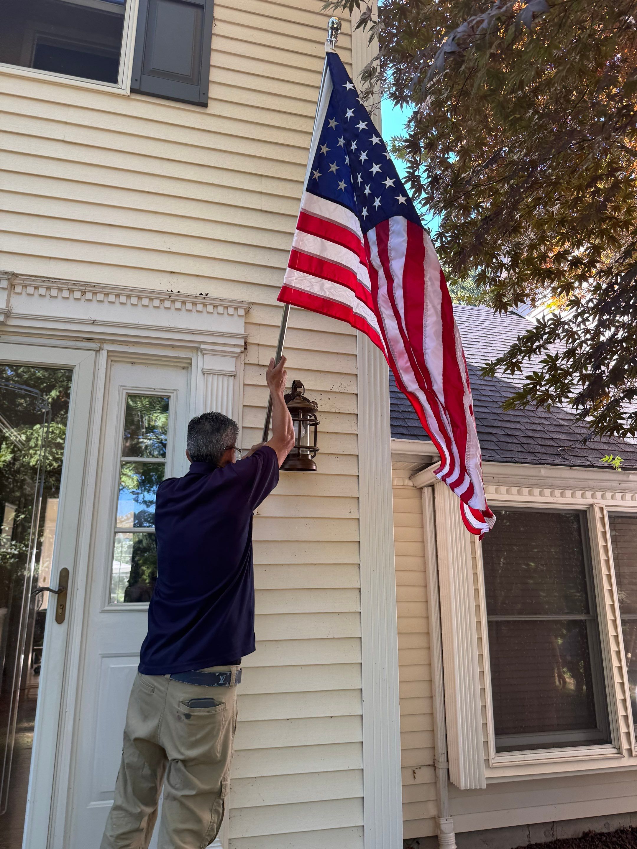 Raising the American flag at the veteran's home