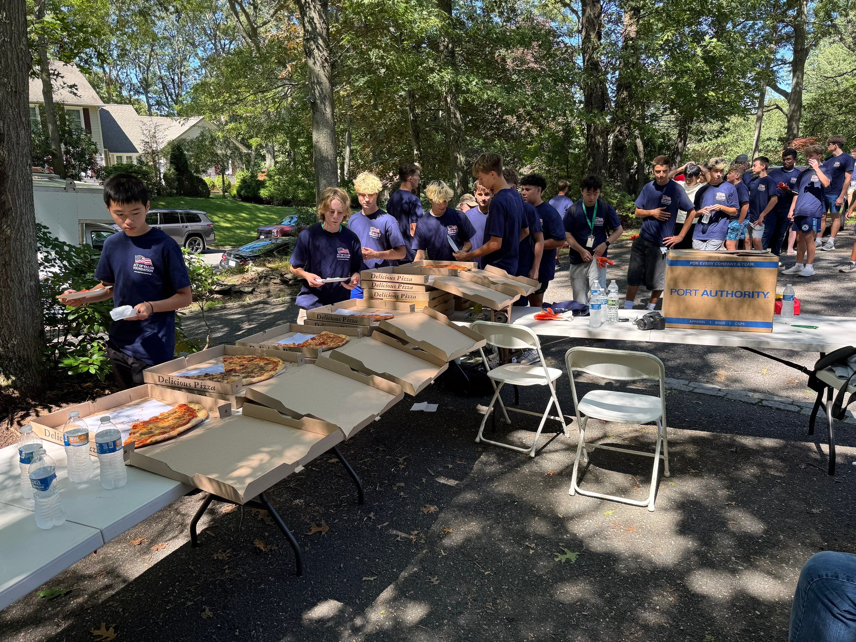 Student volunteers gathered for lunch during the day of service