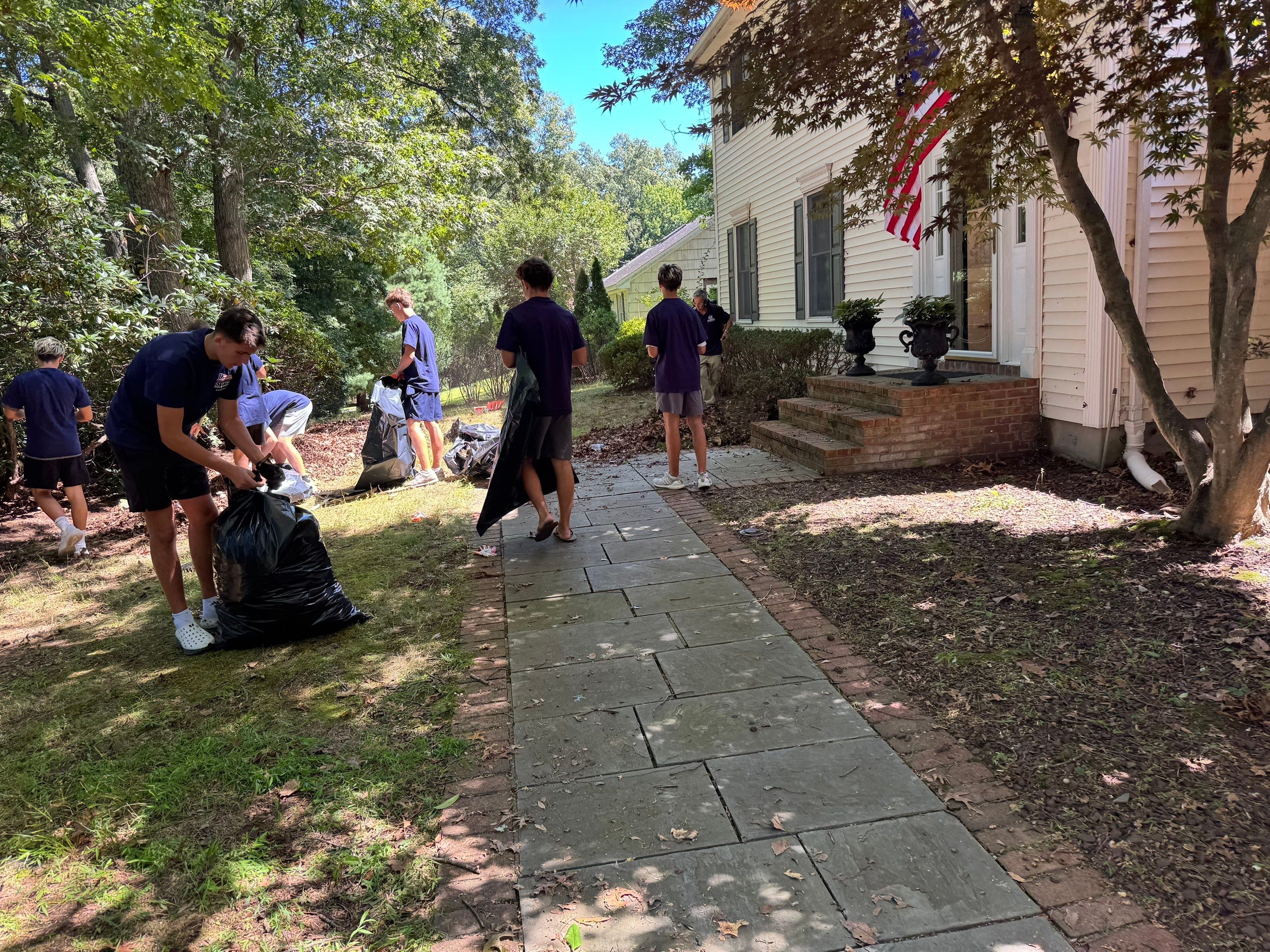 The cleared front walkway of the veteran's home after the cleanup